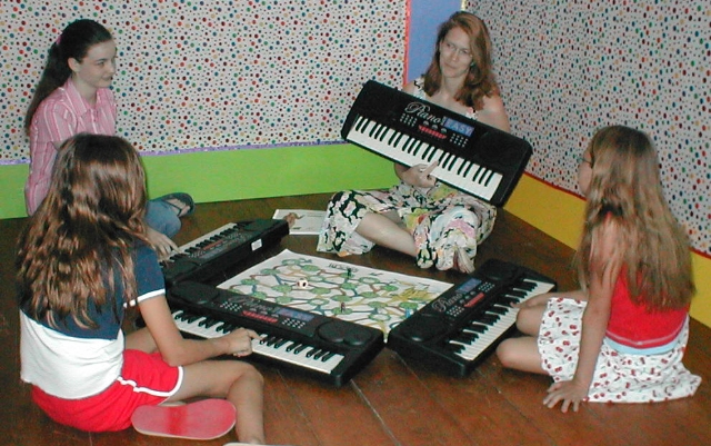 Colleen teaches keyboard geography at game time.